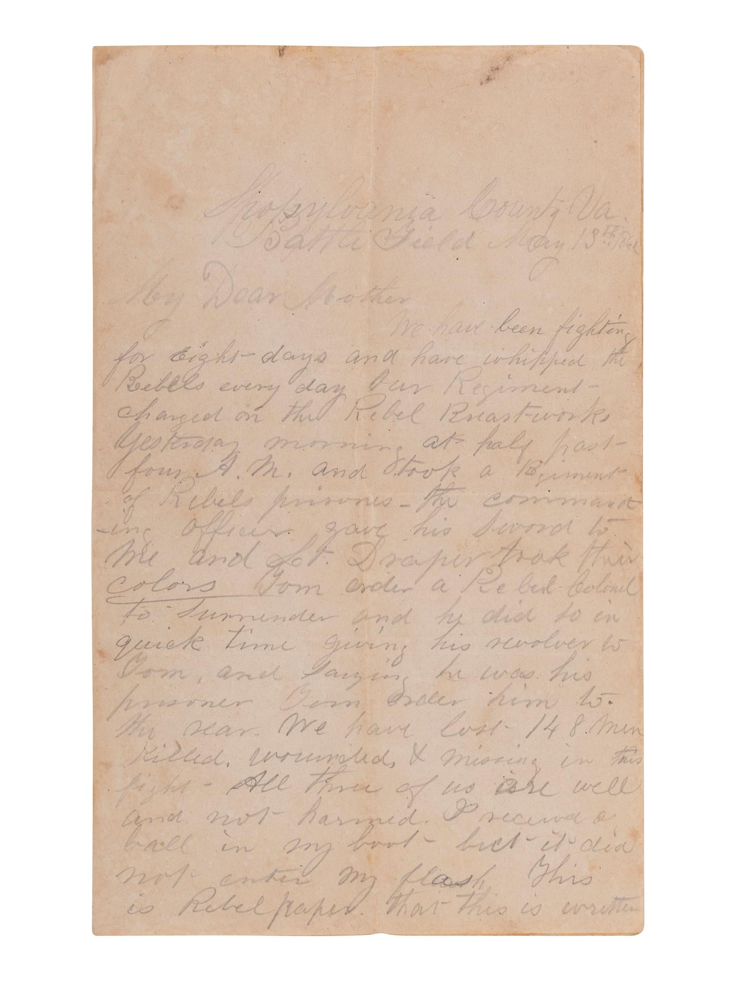[CIVIL WAR]. Letter written on Confederate paper by Major William F. Smith, 1st Delaware Infantry, describing Hancock's assault at the Mule Shoe during the Battle of Spotsylvania Court House. Spotsylvania County, VA, "Battle Field," 13 May 186[4].
