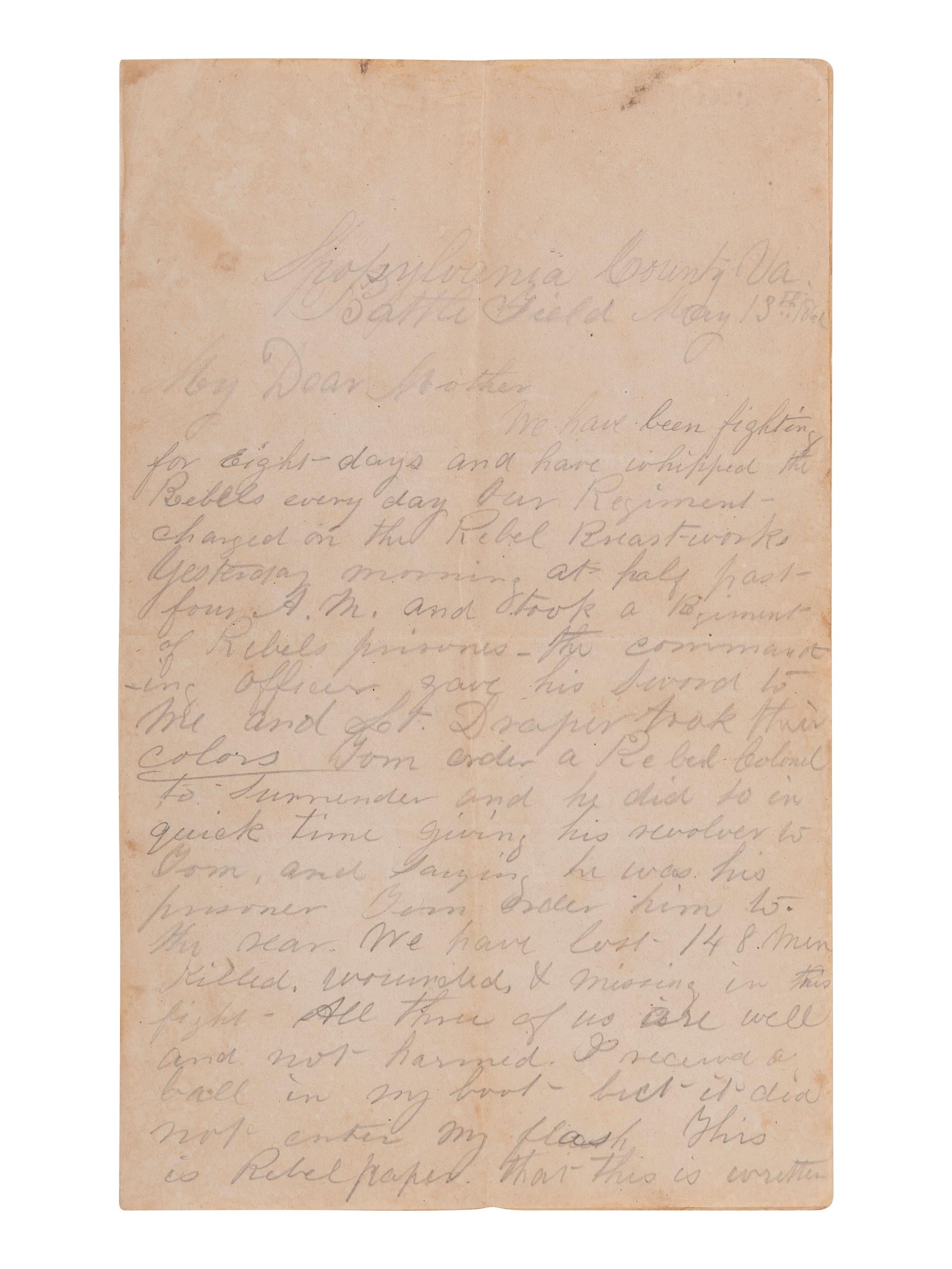 [CIVIL WAR]. Letter written on Confederate paper by Major William F. Smith, 1st Delaware Infantry, describing Hancock's assault at the Mule Shoe during the Battle of Spotsylvania Court House. Spotsylvania County, VA, "Battle Field," 13 May 186[4].