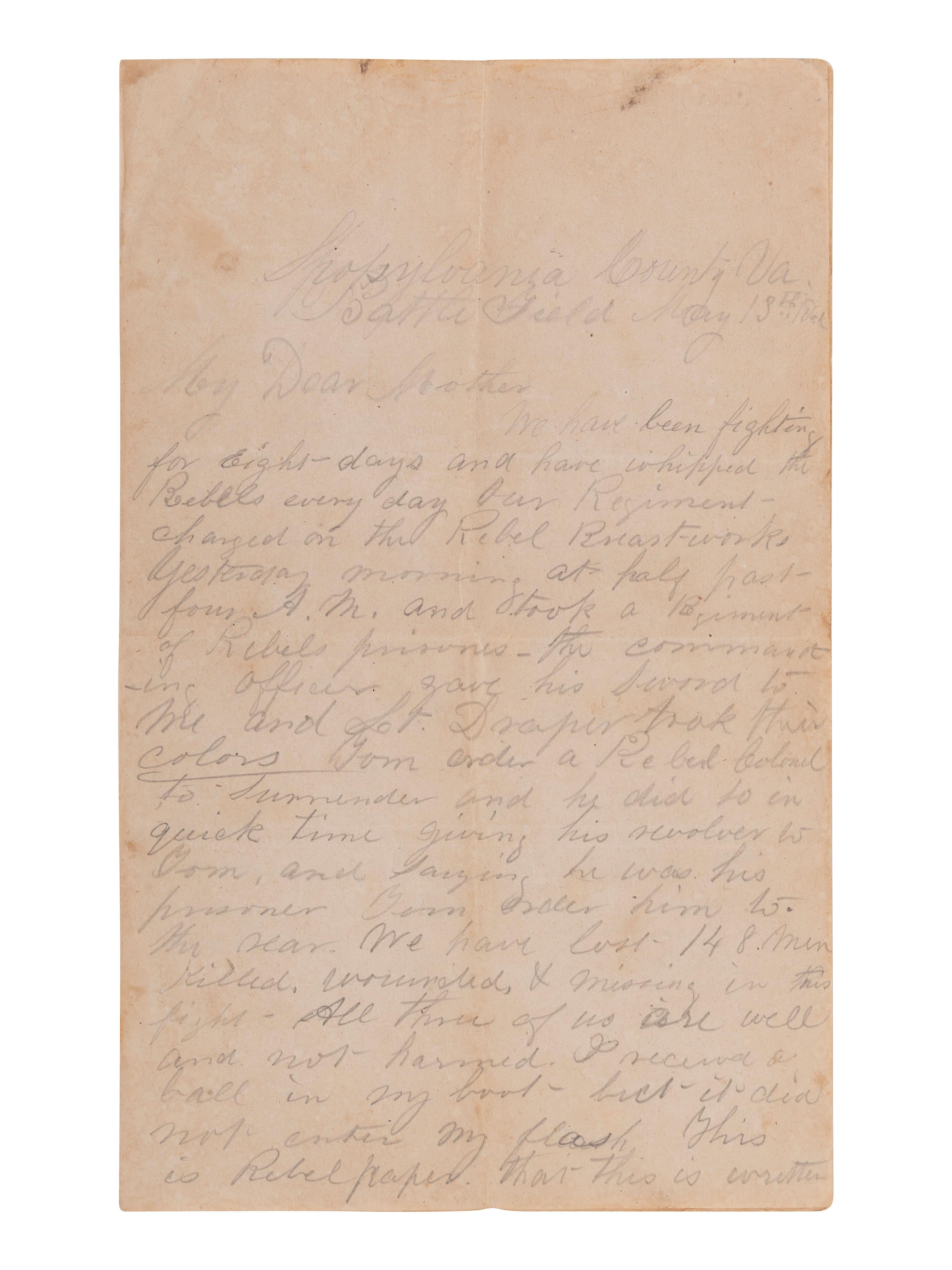 [CIVIL WAR]. Letter written on Confederate paper by Major William F. Smith, 1st Delaware Infantry, describing Hancock's assault at the Mule Shoe during the Battle of Spotsylvania Court House. Spotsylvania County, VA, "Battle Field," 13 May 186[4].
