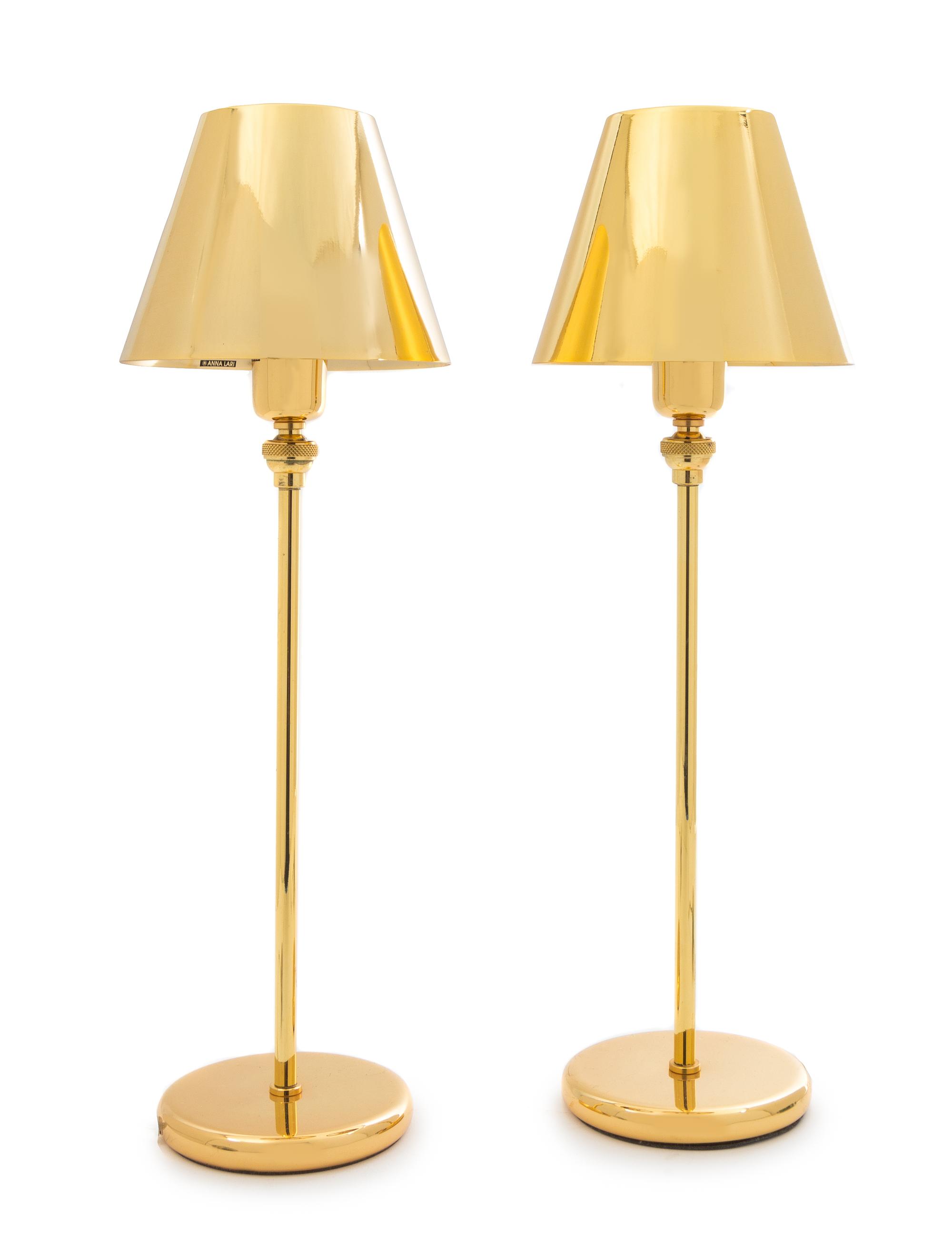 A Pair of Anna Lari Gold-Plated Emi Table Lamps Height 18 inches. — DESIGNED 1991