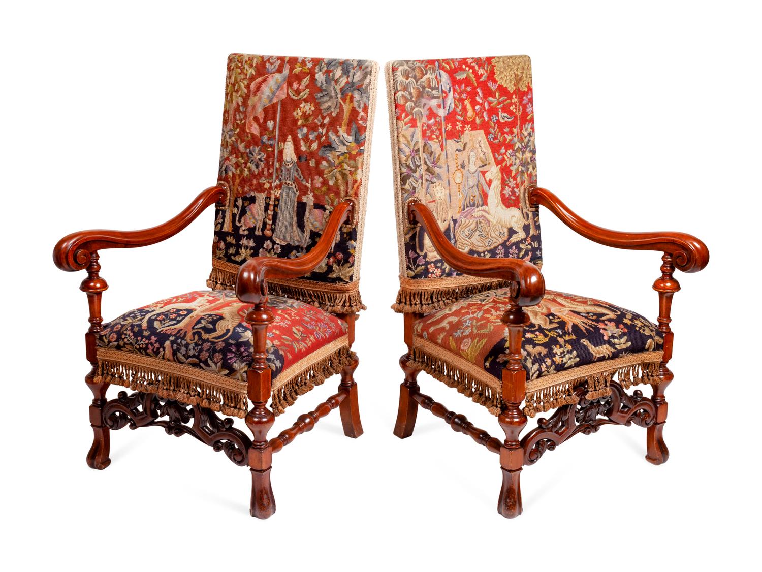 A Pair of Continental Carved Oak Upholstered Chairs