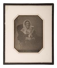 [EARLY PHOTOGRAPHY]. A group of 9 European portraits in wall frames, highlighted by attractive daguerreotypes of men, women, and children, including: