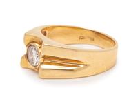 A 14 Karat Yellow Gold and Diamond Ring,