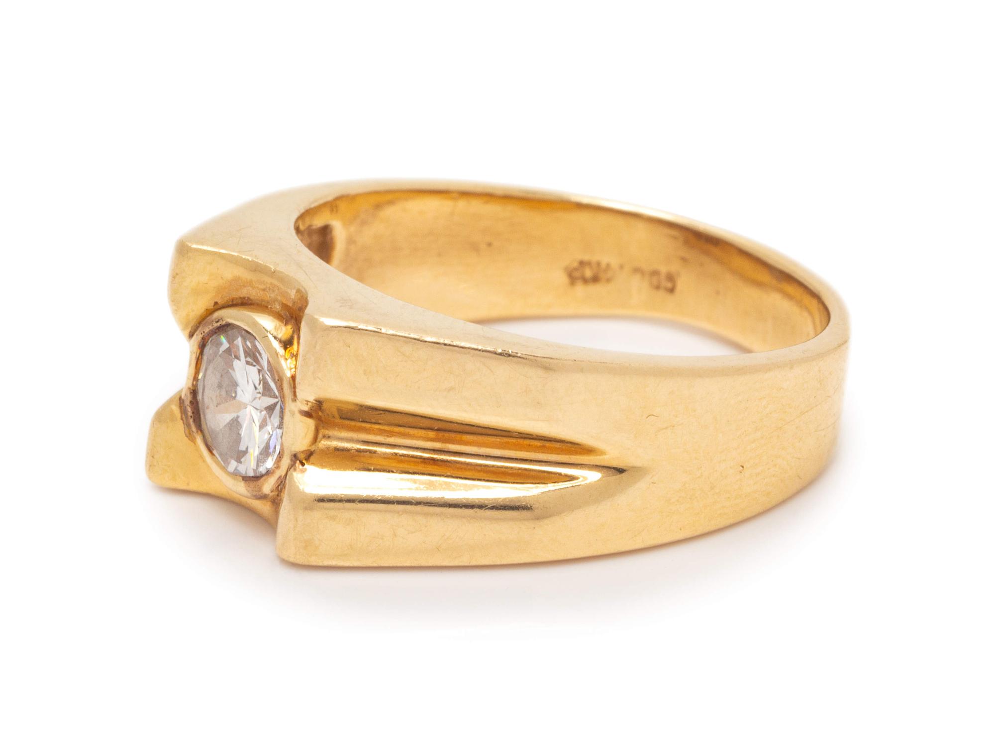 A 14 Karat Yellow Gold and Diamond Ring,