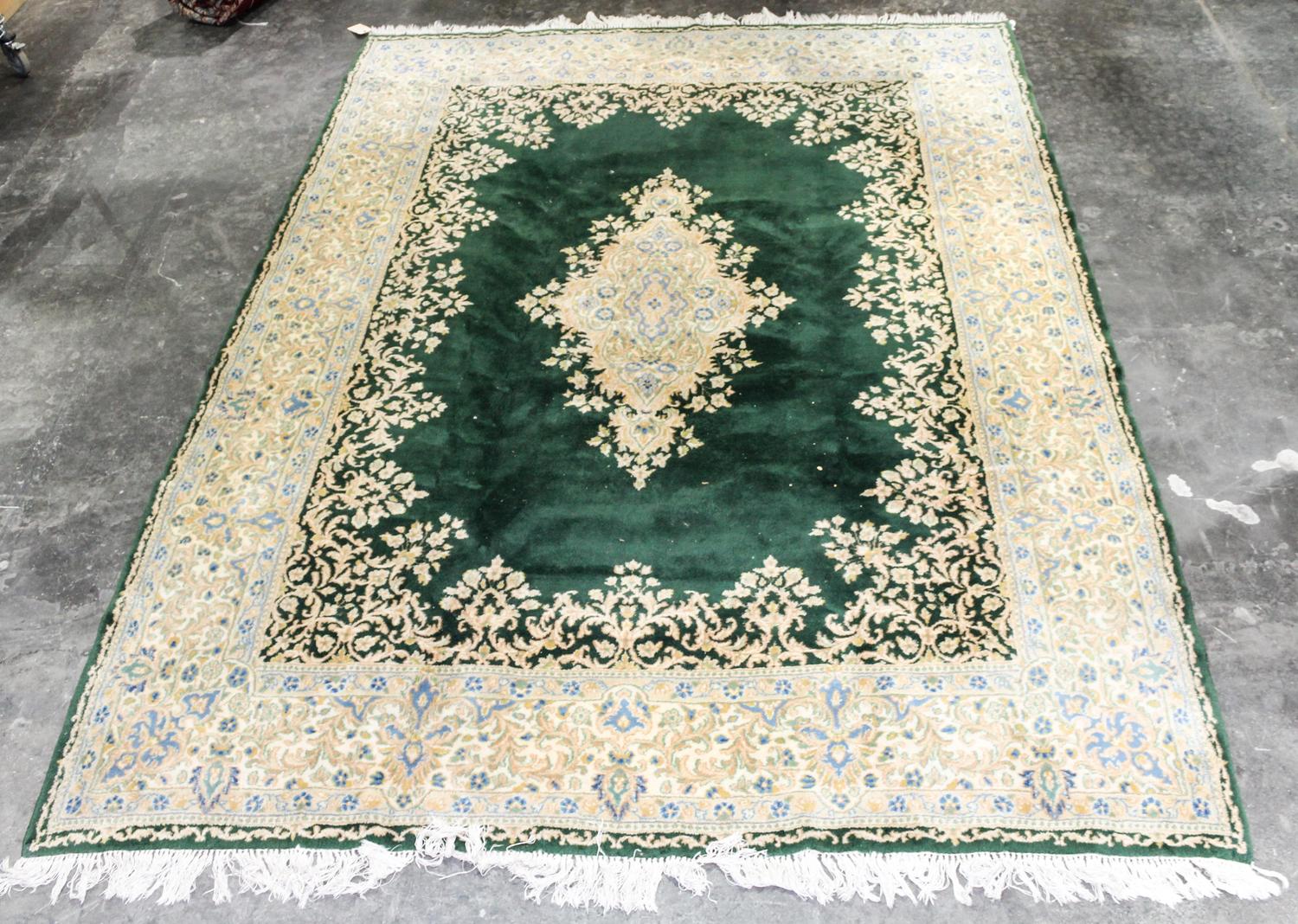 A Kirman Wool Rug 12 feet 1 inch x 8 feet 9 inches. — SECOND HALF 20TH CENTURY