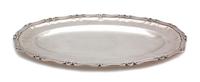 A Peruvian Silver Oval Platter, , having C-scroll border