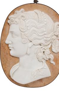 A Set of Four Carved Marble and Iron Mounted Profile Plaques
