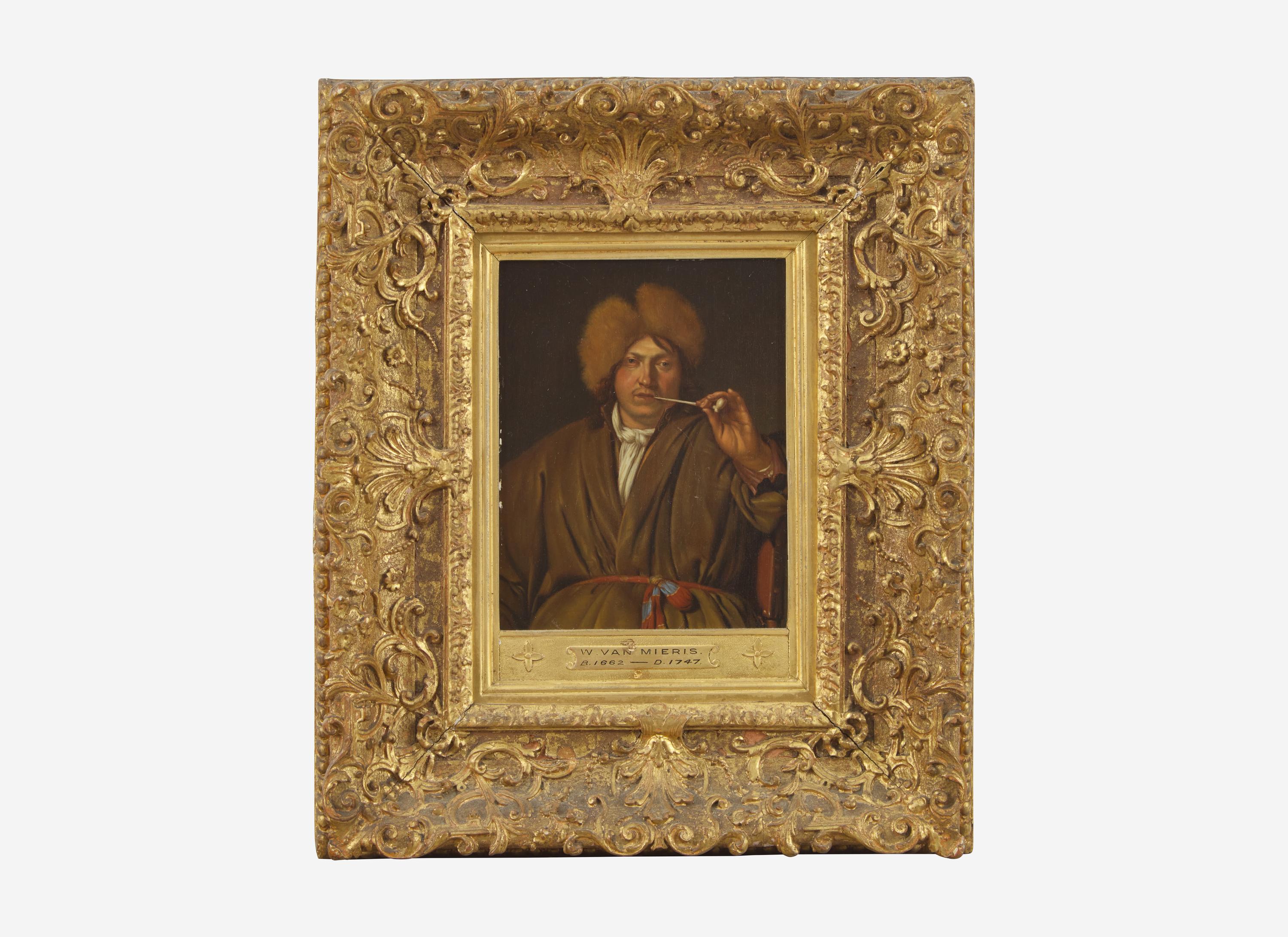 Man Holding a Pipe