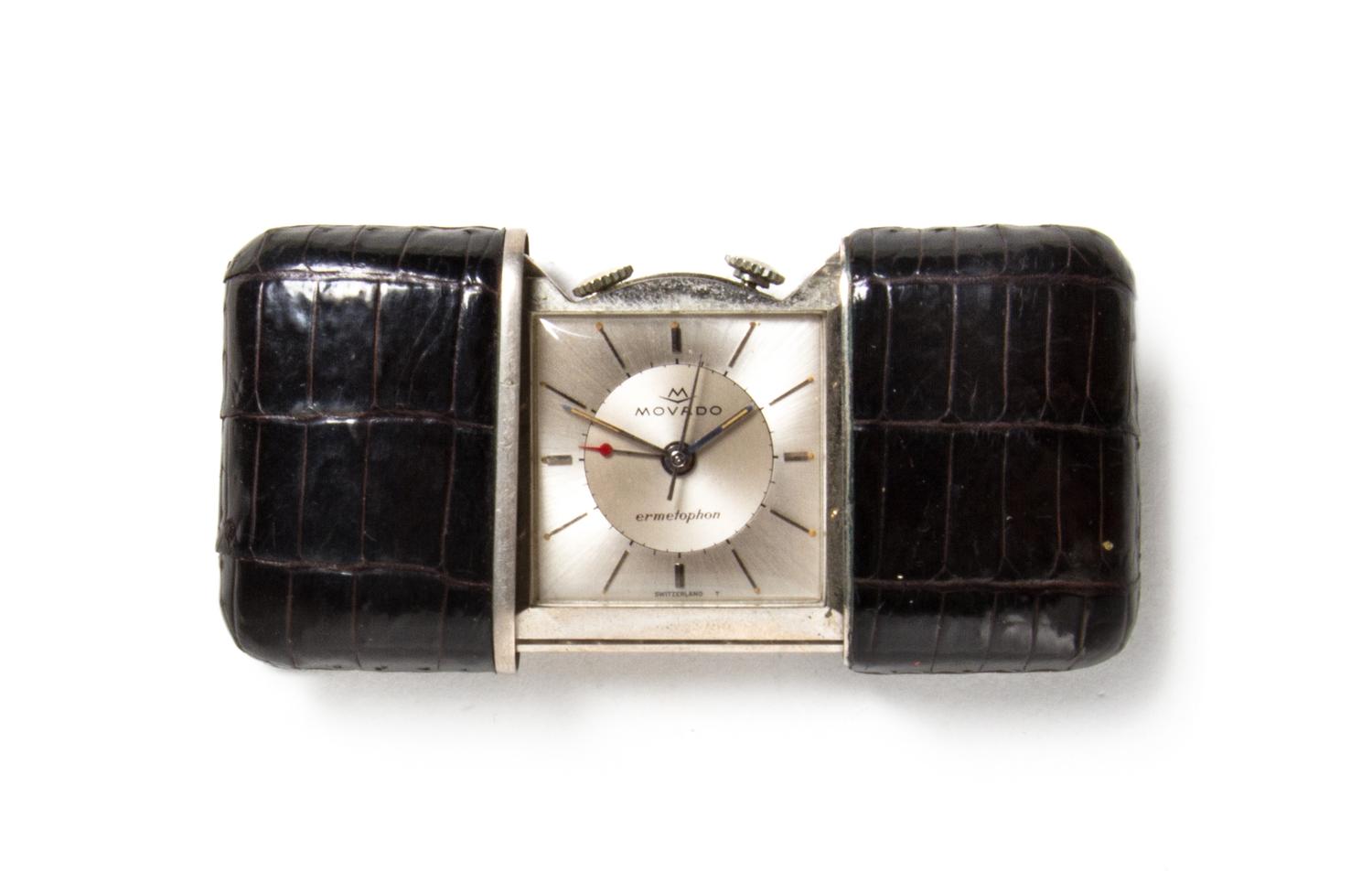A Movado Self Winding Ermetophon Purse Watch, Height 1 1/2 x width 2 inches (closed).