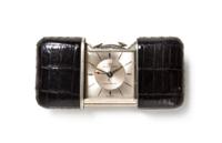 A Movado Self Winding Ermetophon Purse Watch, Height 1 1/2 x width 2 inches (closed).