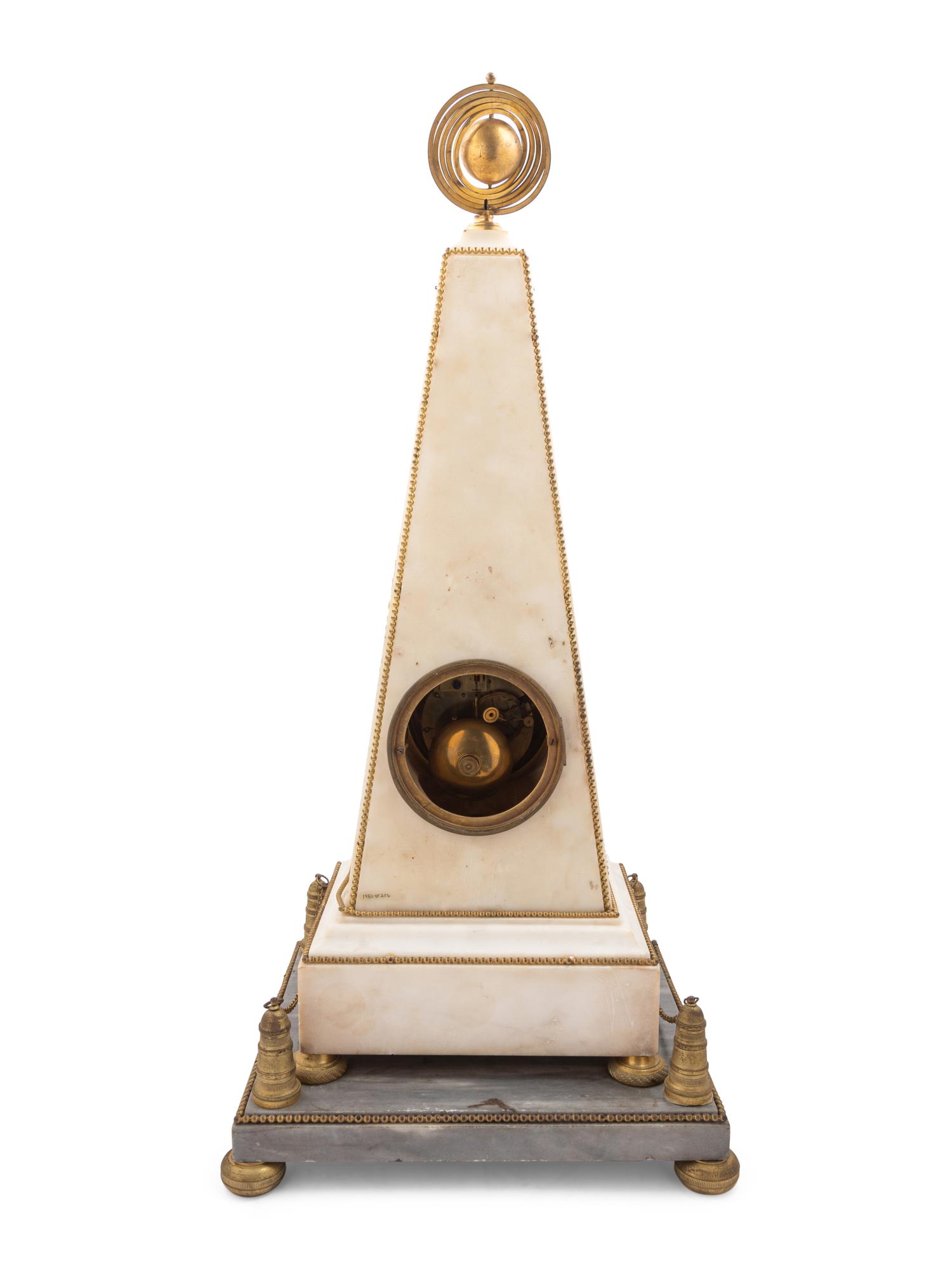 A Late Louis XVI or Directoire Gilt Bronze and Marble Obelisk Clock and Stand