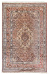 A Tabriz Wool Carpet 9 feet 7 inches x 6 feet 5 inches.