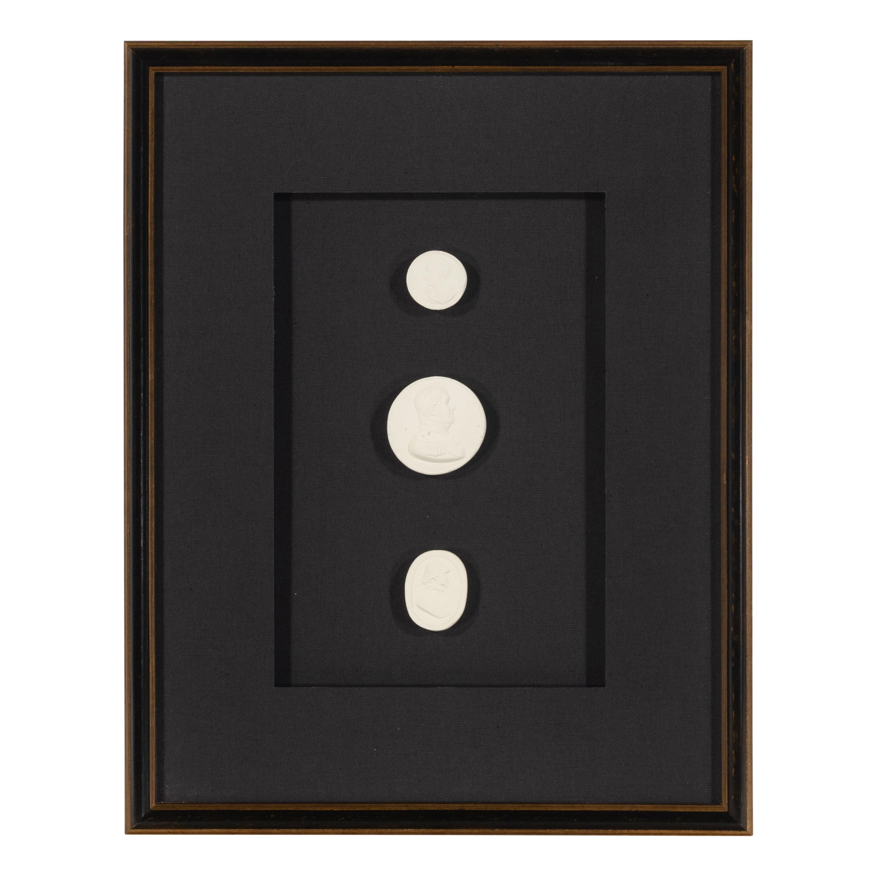 A Set of Three Framed Groups of Plaster Intaglios