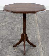 An Arts and Crafts Oak Tilt Top Pedestal Table Height 27 1/2 x width 23 1/2 x depth 14 inches.