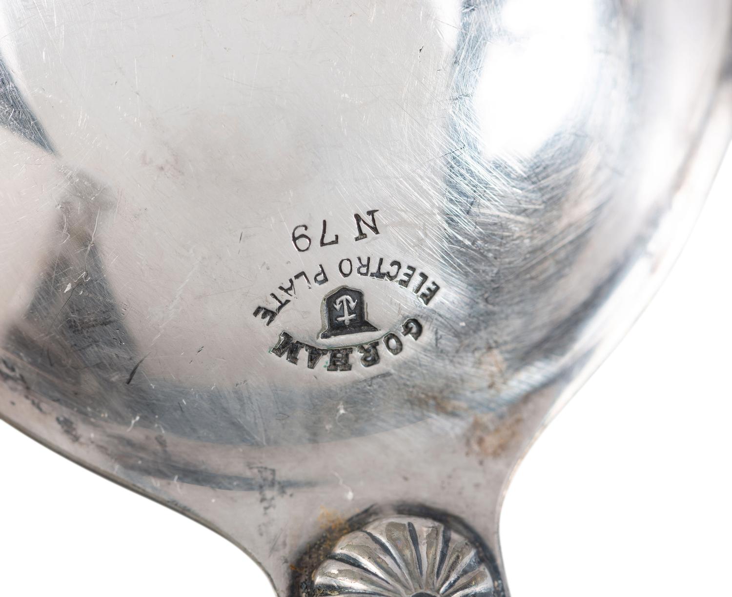 Eight American and Continental Silver and Silverplate Wood-Handled Serving Utensils