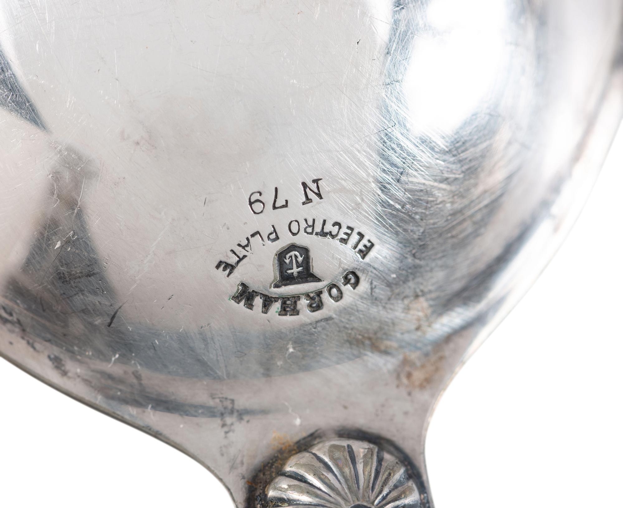 Eight American and Continental Silver and Silverplate Wood-Handled Serving Utensils