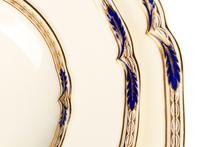 A Minton Porcelain Dinner Service