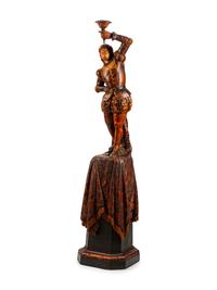 An Austrian Carved and Stained Wood Figural Torchère — LATE 19TH CENTURY
