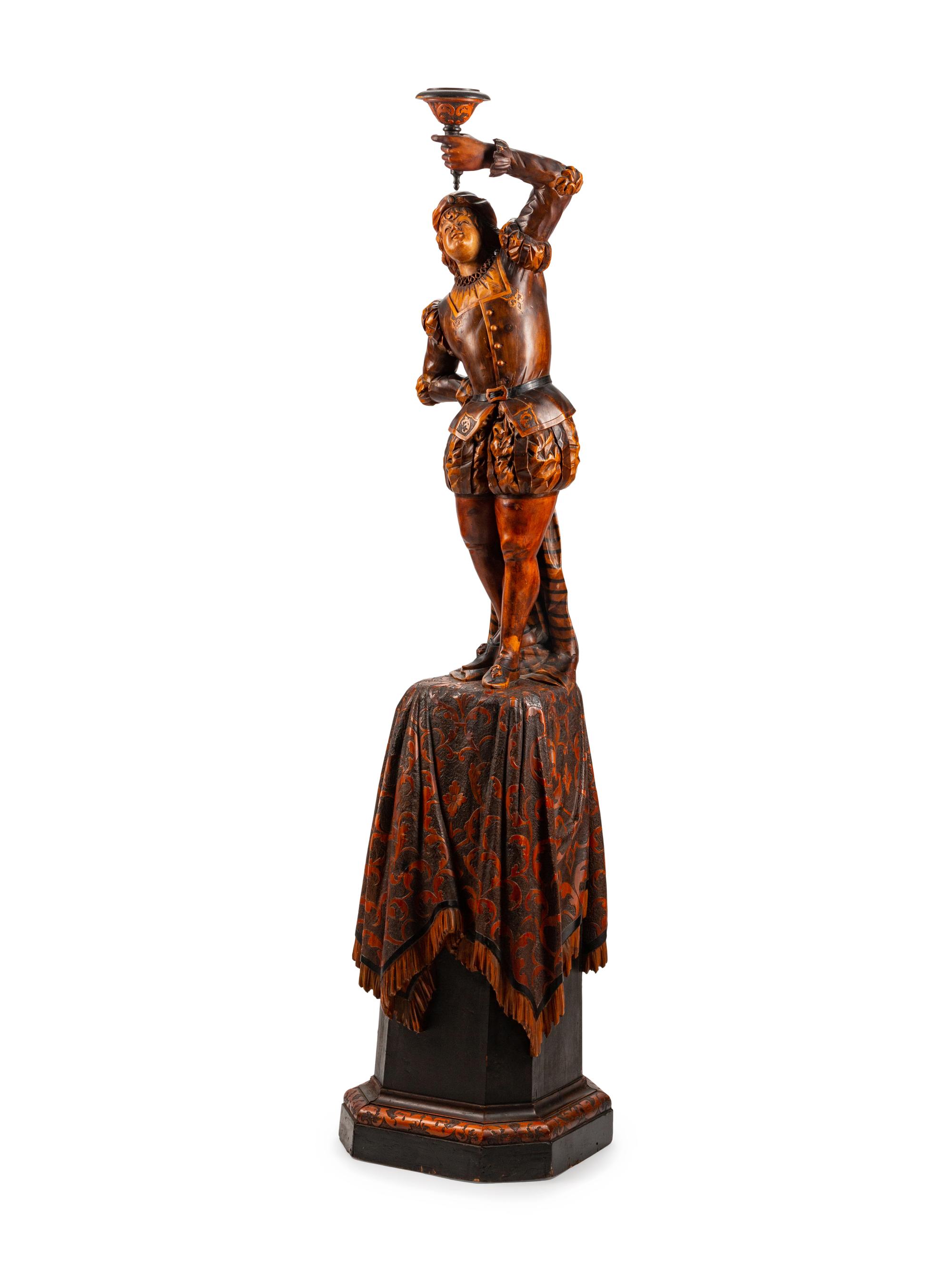 An Austrian Carved and Stained Wood Figural Torchère — LATE 19TH CENTURY