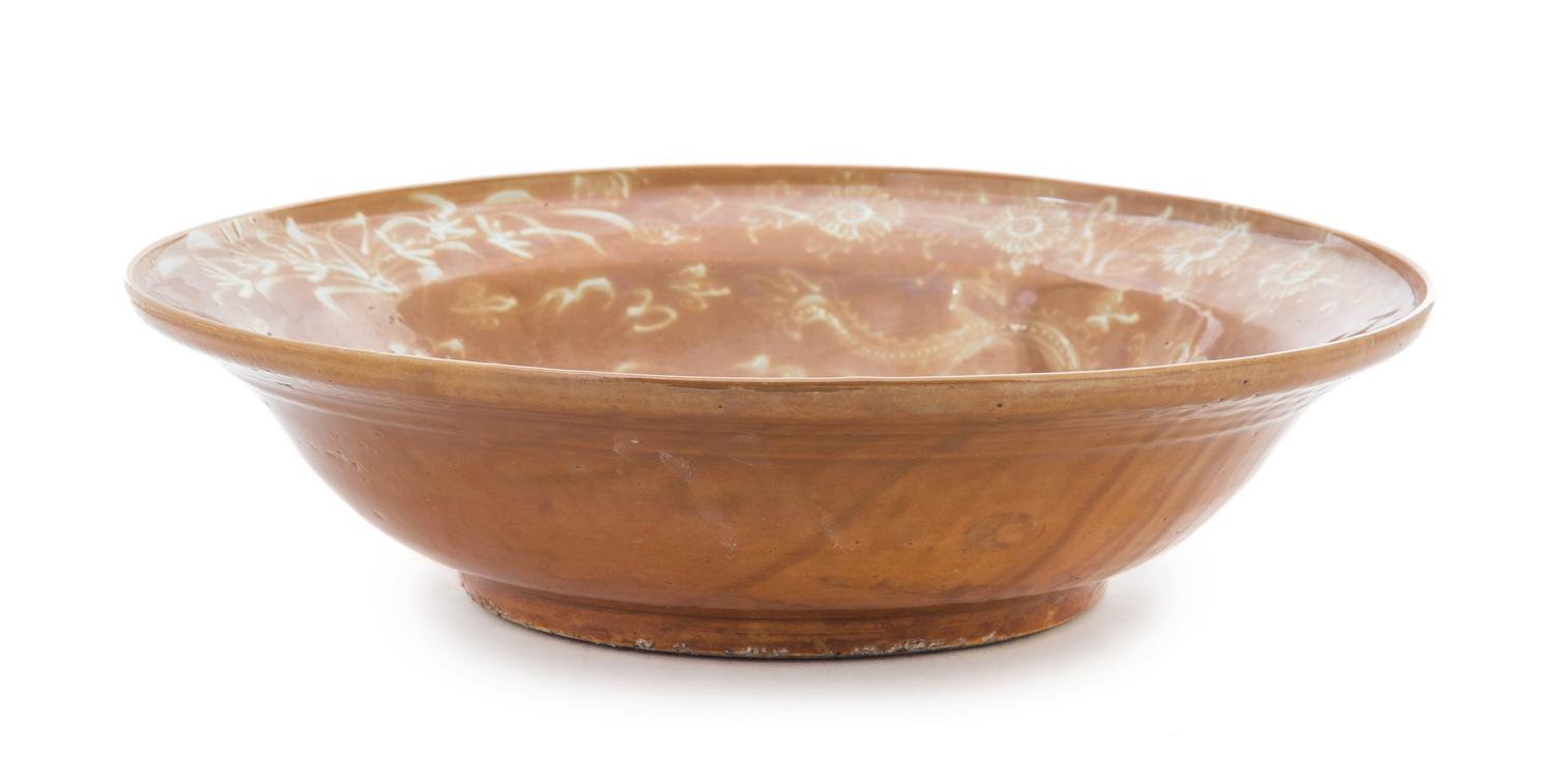 A Large Swatow Slip Decorated Brown Glazed Porcelain Charger Diameter 16 inches. — MING DYNASTY, SECOND HALF OF 16TH CENTURY