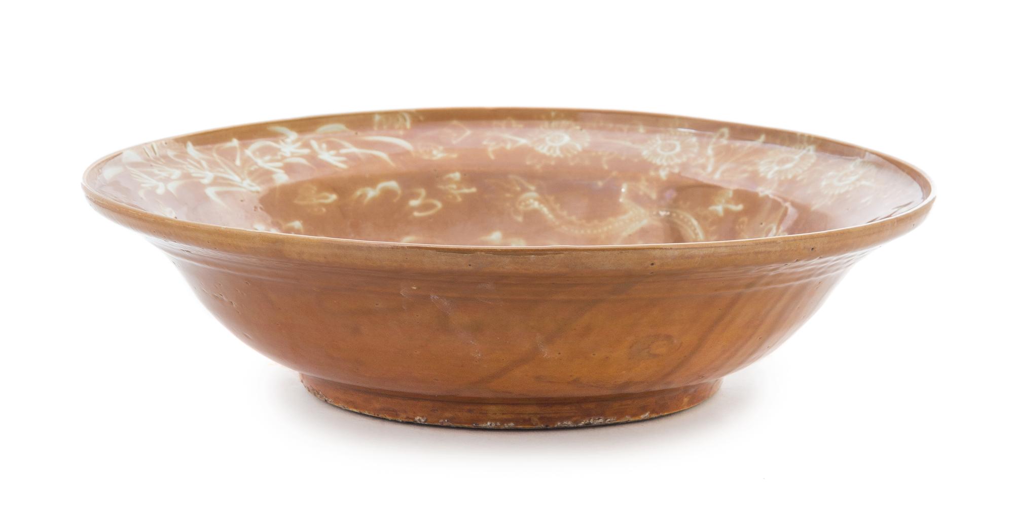 A Large Swatow Slip Decorated Brown Glazed Porcelain Charger Diameter 16 inches. — MING DYNASTY, SECOND HALF OF 16TH CENTURY
