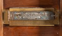 A Roepke Orchestral Book Playing Music Box with Fifteen Books