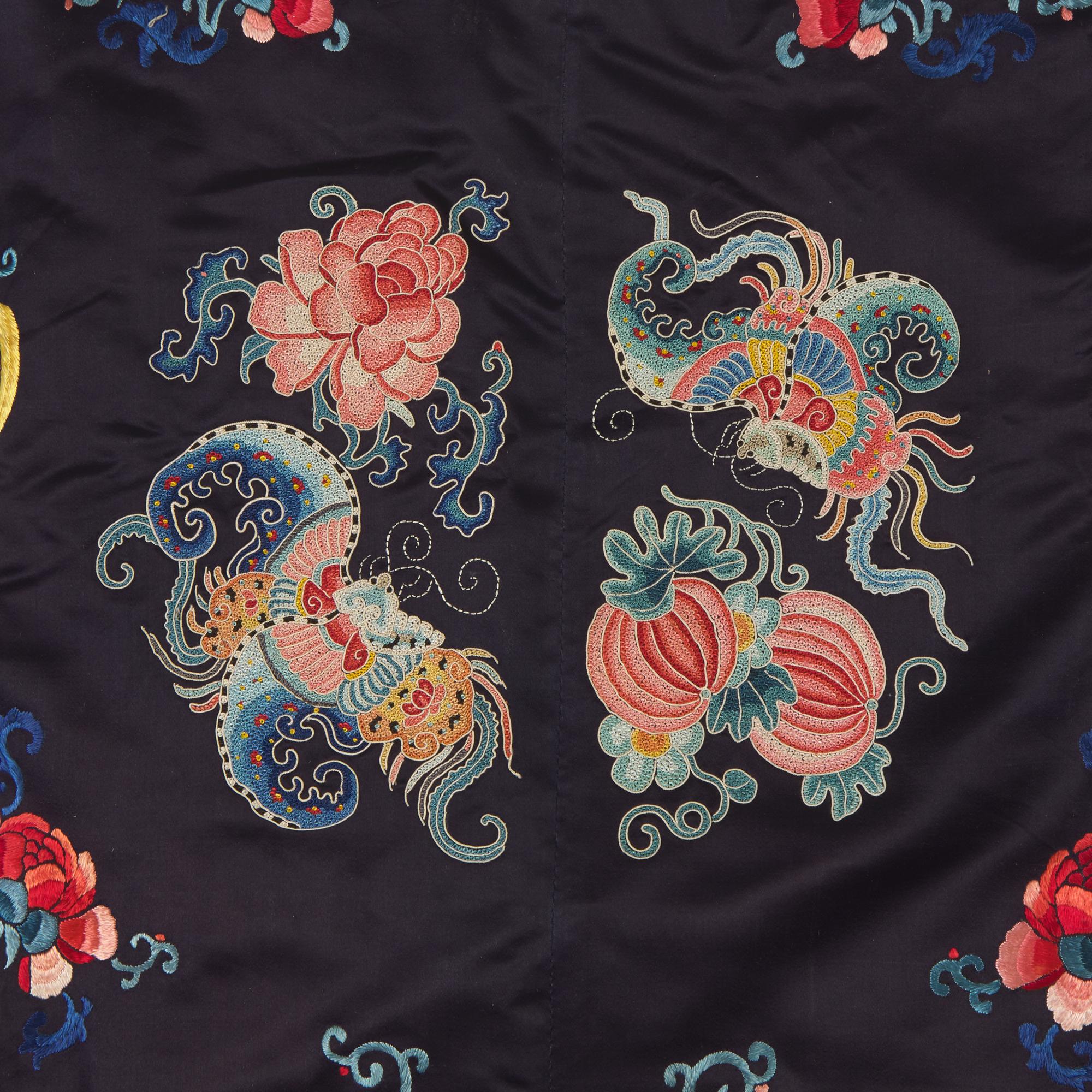 A Chinese Embroidered Midnight Blue Silk Lady's Robe, Late Qing Dynasty 晚清 深藍地繡瓜瓞綿綿女袍