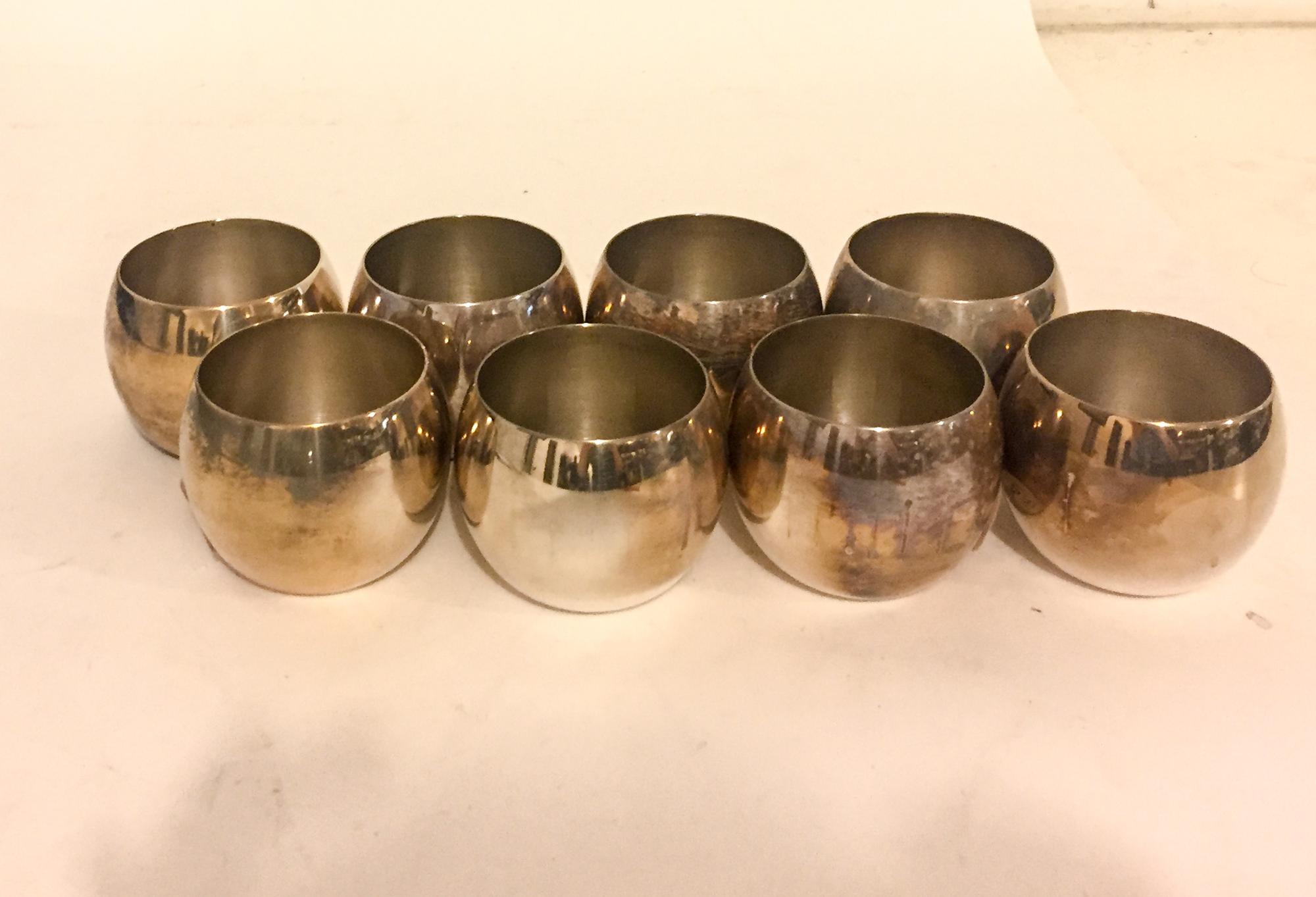A Set of Eight Poole Silver-Plate Wines Height of first set 2 1/2 inches. — 20TH CENTURY