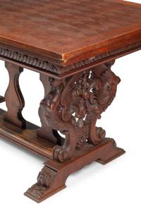 An Italian Renaissance Revival Draw-Leaf Dining Table