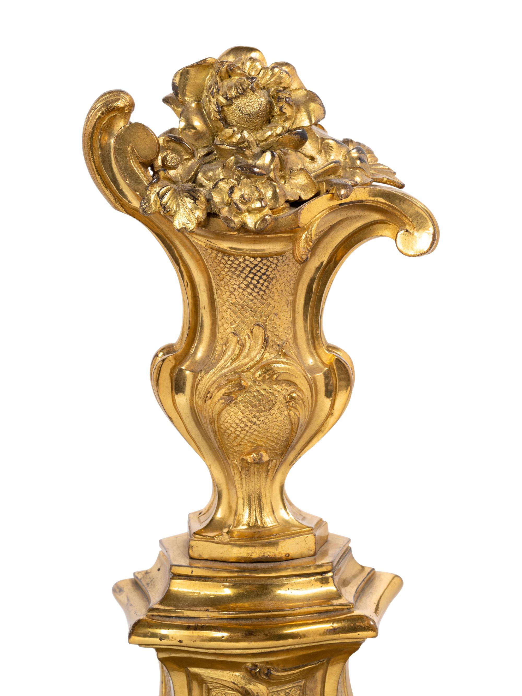 A Pair of Régence Style Gilt Bronze Chenets