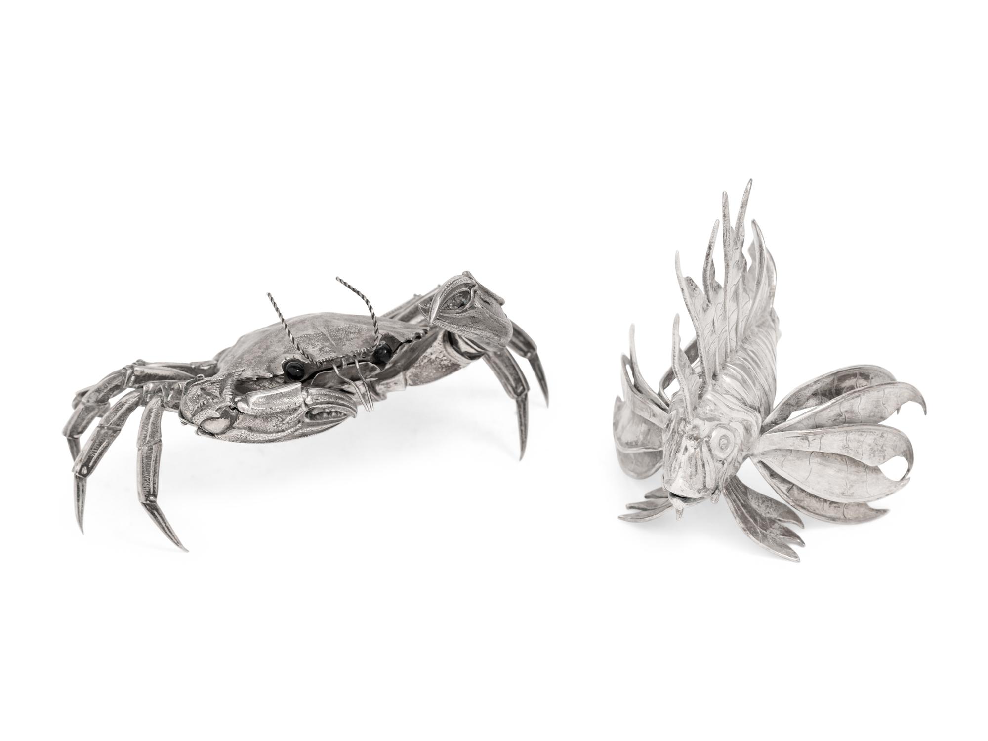 A Silver Model of a Crab and Lionfish