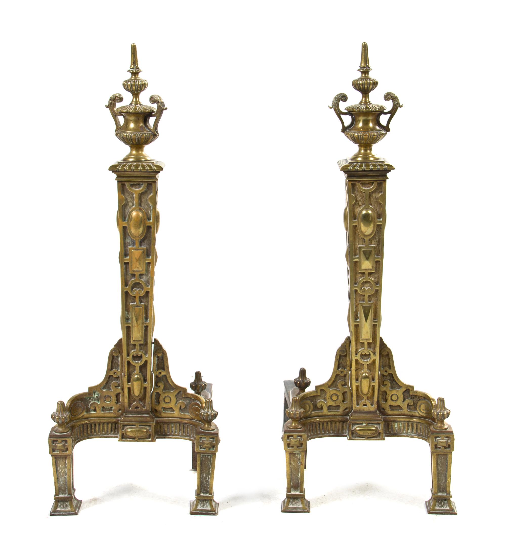 A Pair of Neoclassical Bronze and Iron Andirons, Height 30 inches.