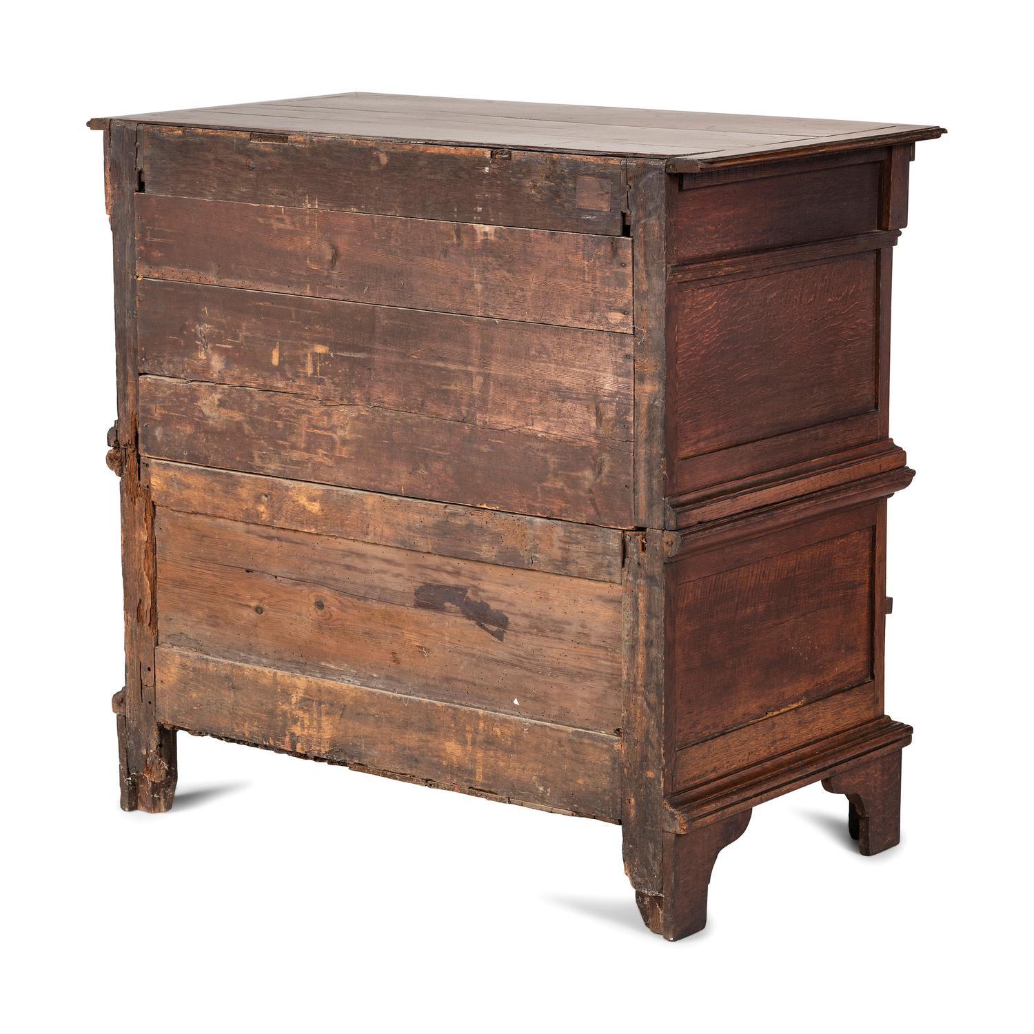 A Charles II Carved Oak Chest of Drawers