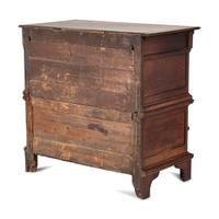 A Charles II Carved Oak Chest of Drawers