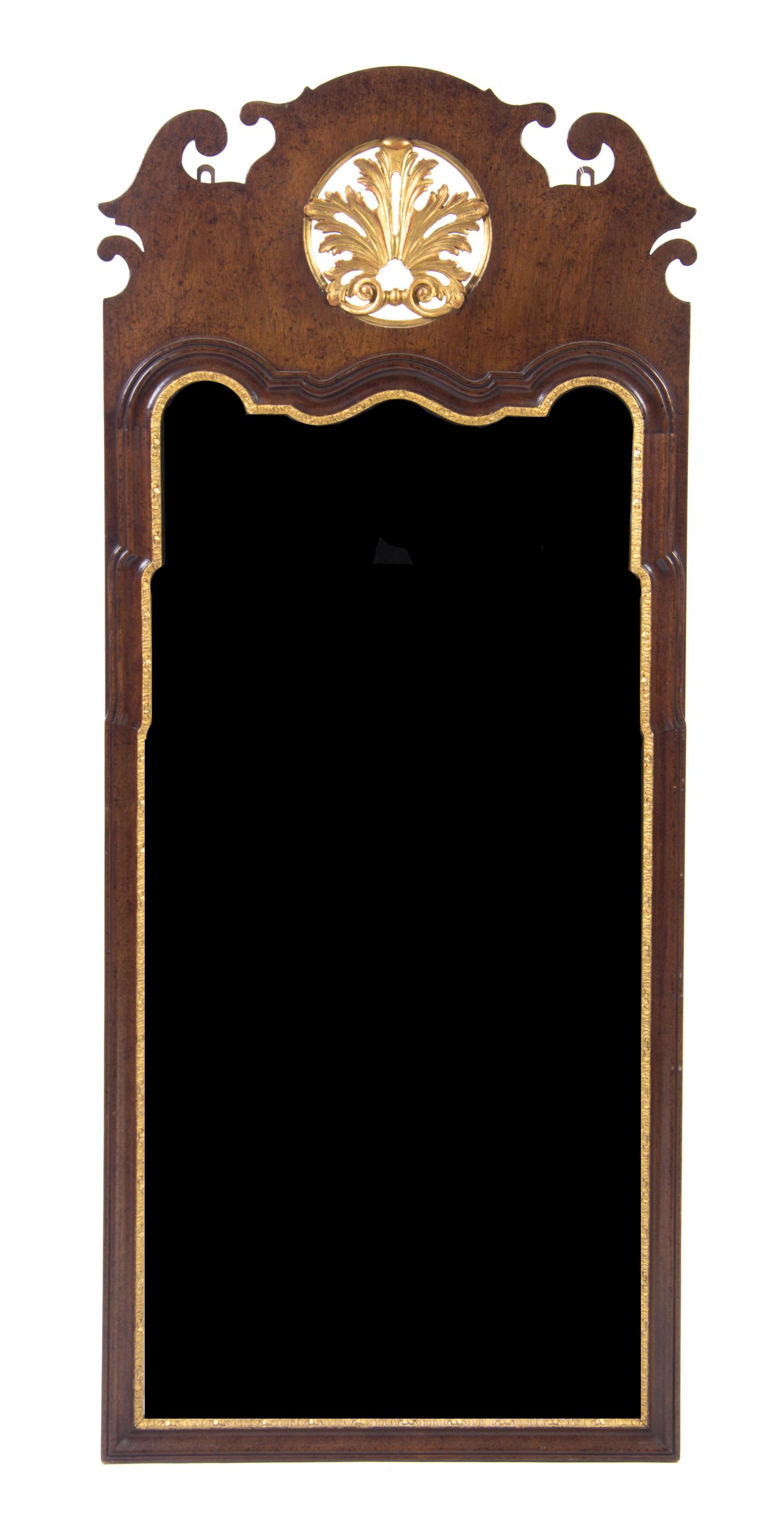 A Chippendale Style Parcel Gilt Mirror, Height 58 x width 24 inches.