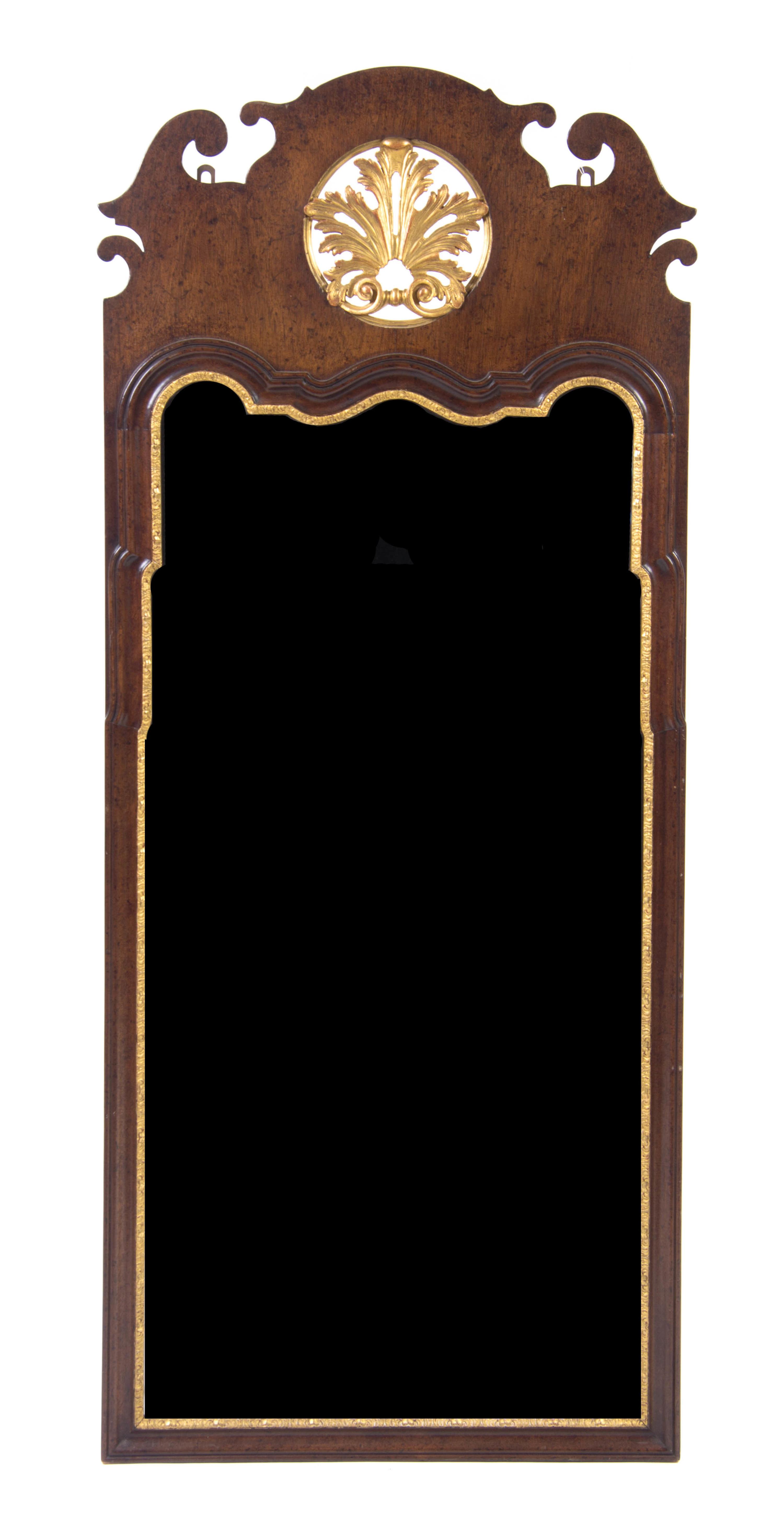 A Chippendale Style Parcel Gilt Mirror, Height 58 x width 24 inches.