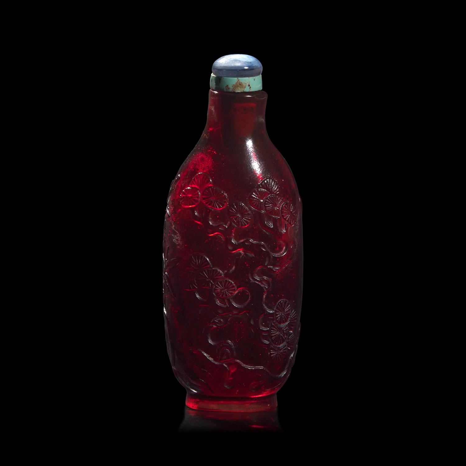 A Chinese Carved Ruby Glass Snuff Bottle, Probably Imperial Workshop, 18th Century
