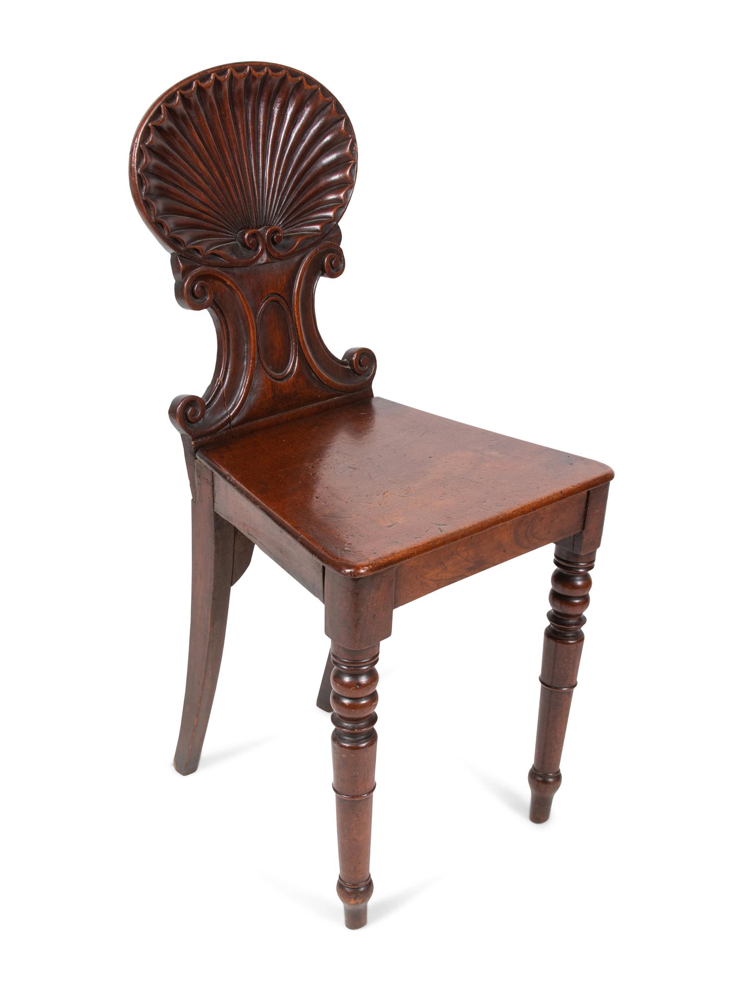 A Pair of Regency Style Mahogany Hall Chairs