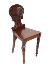 A Pair of Regency Style Mahogany Hall Chairs