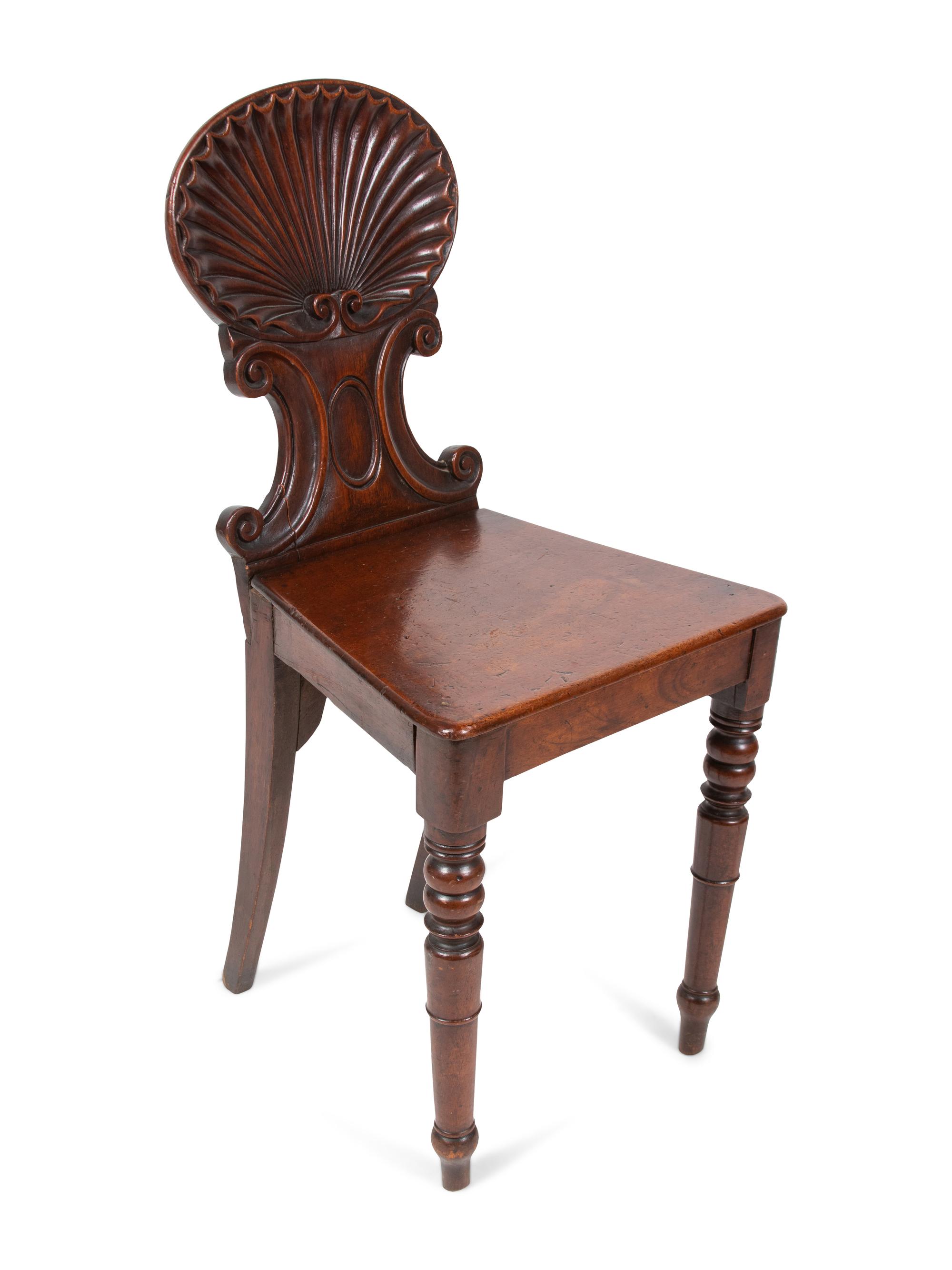 A Pair of Regency Style Mahogany Hall Chairs