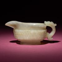 A Chinese Pale Celadon Jade Archaistic Yi Vessel, 17th Century — 清早期 青白玉仿古龍紋匜
