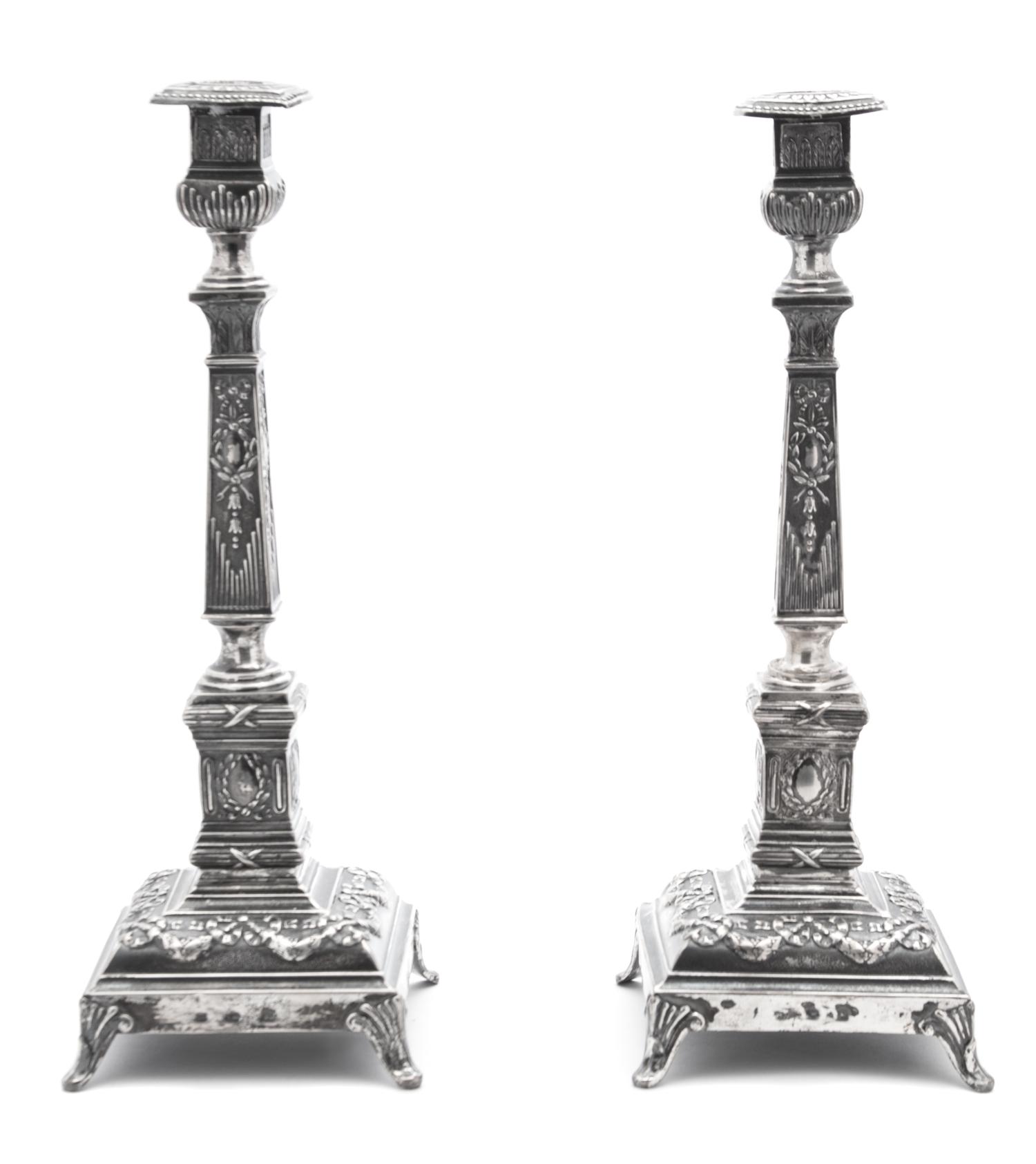 A Pair of Russian Silver Candlesticks