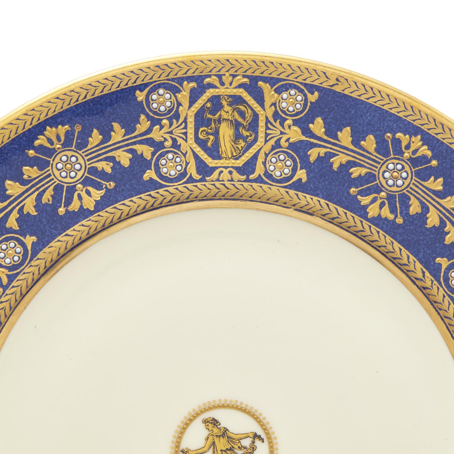 A Set of Twelve Wedgwood Porcelain Dinner Plates
