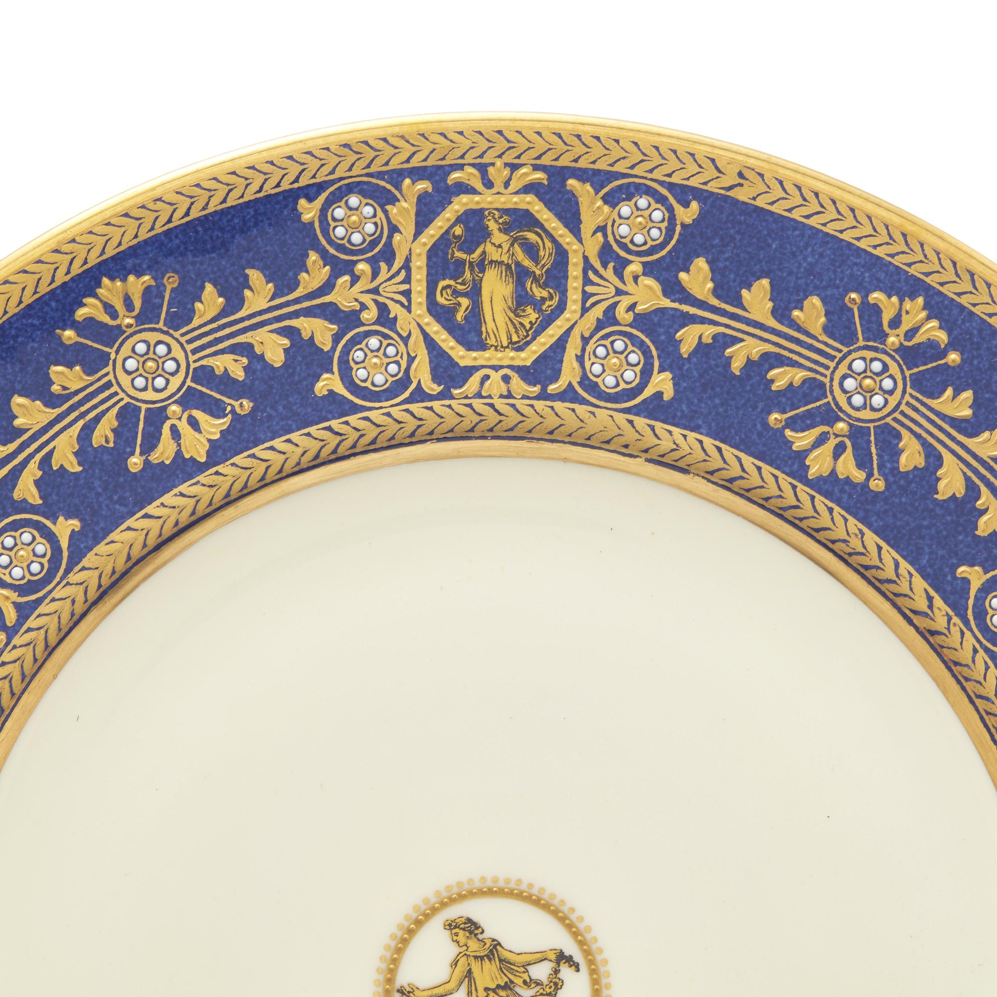 A Set of Twelve Wedgwood Porcelain Dinner Plates
