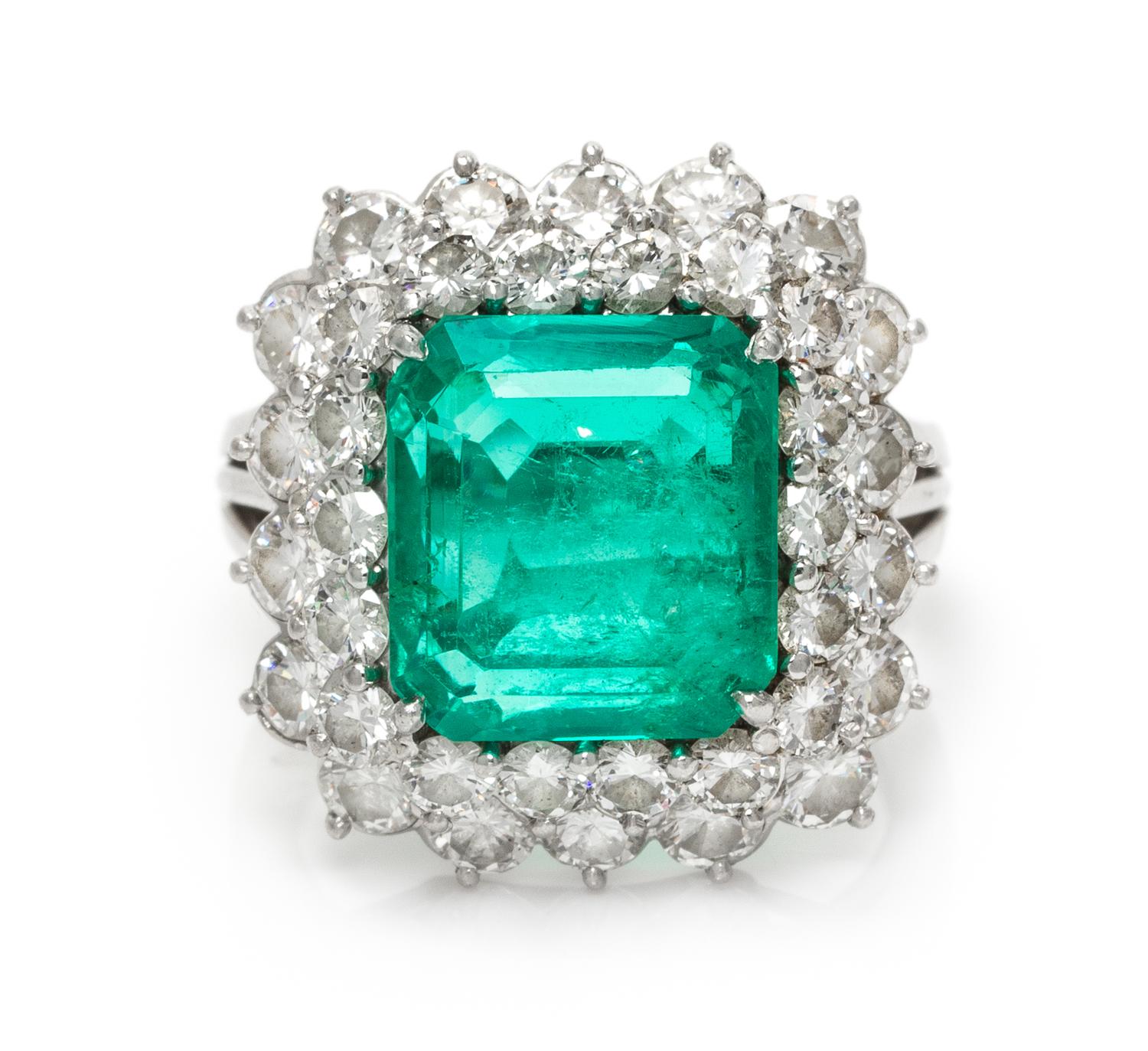 A Platinum, Emerald and Diamond Ring, 7.90 dwts.
