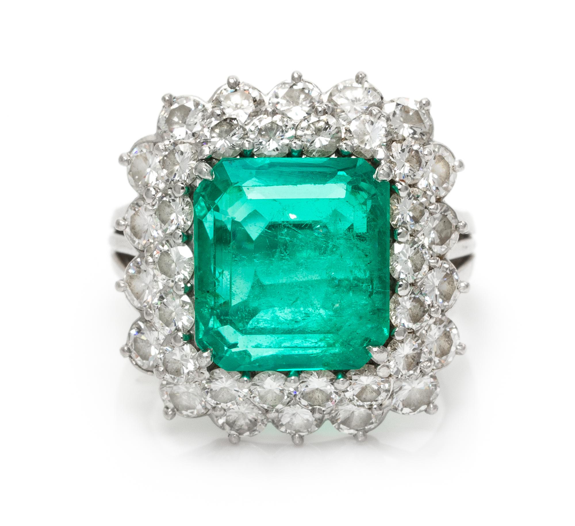 A Platinum, Emerald and Diamond Ring, 7.90 dwts.