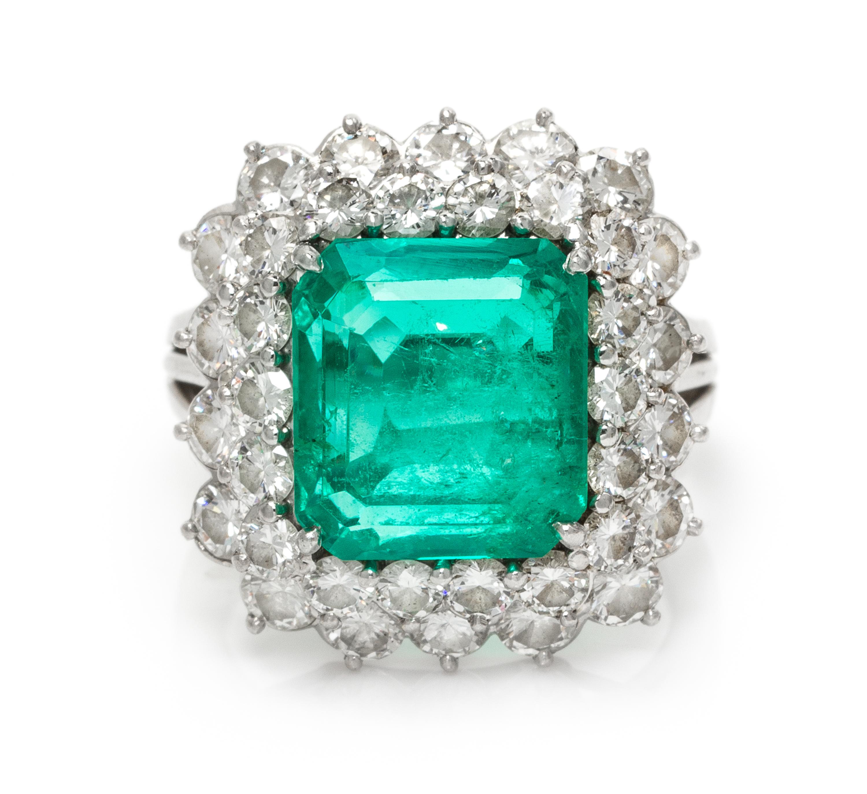 A Platinum, Emerald and Diamond Ring, 7.90 dwts.