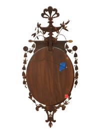 A Neoclassical Style Giltwood Oval Mirror