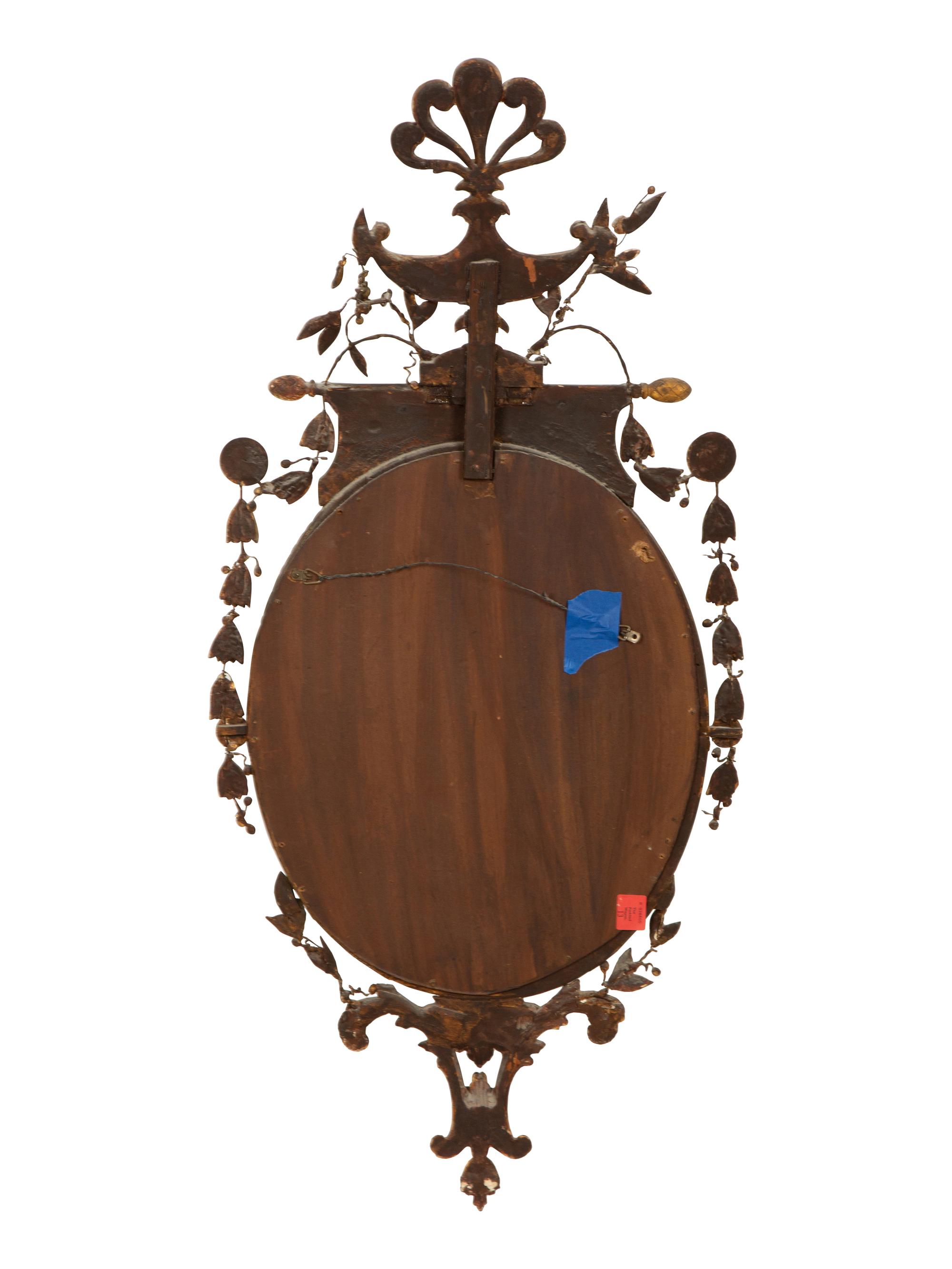 A Neoclassical Style Giltwood Oval Mirror