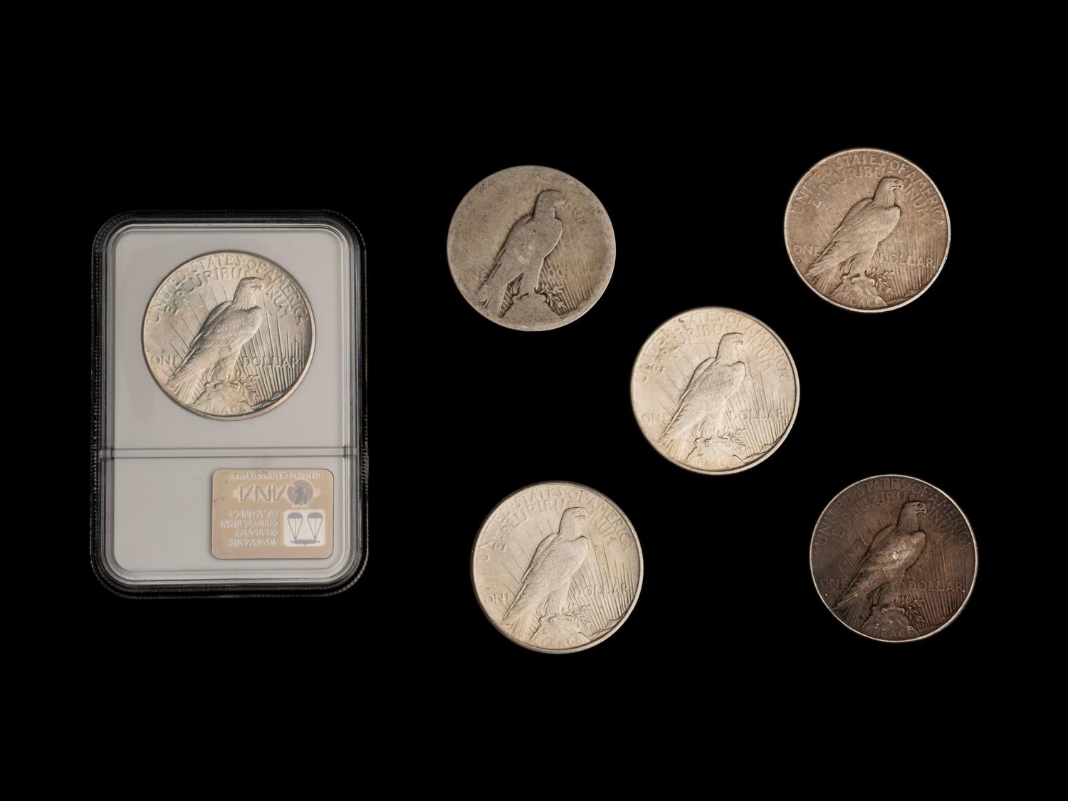 A Large Collection of One Hundred and Thirty-Nine Peace $1 Coins